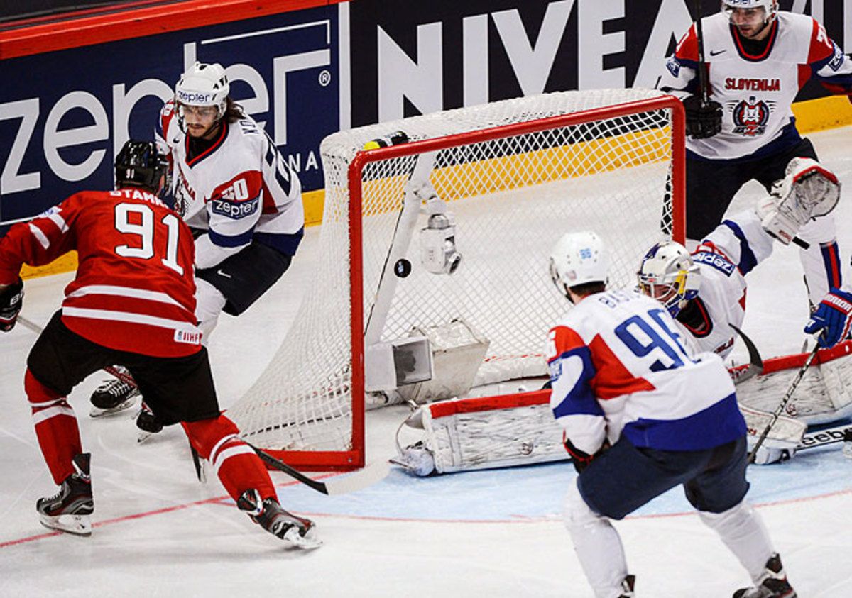 Canada's Steven Stamkos scores against Slovenia to tie the game in the second period on Monday.