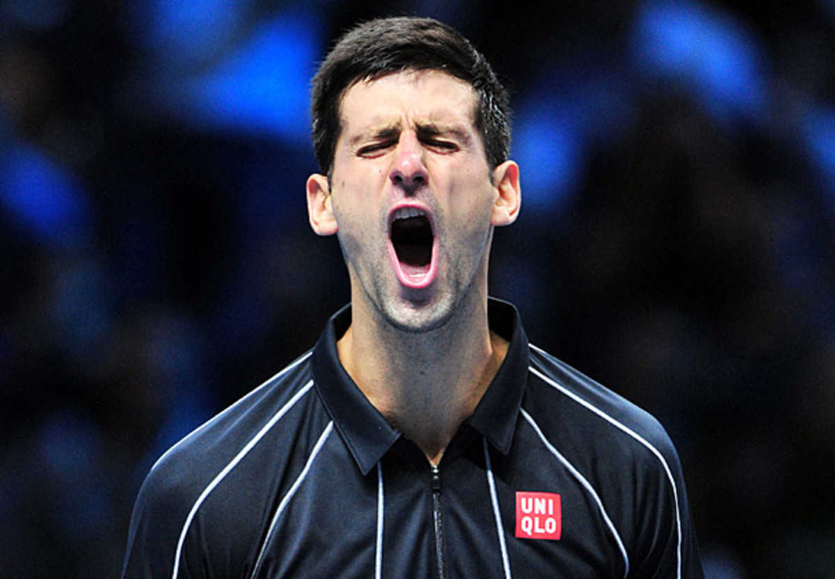 Novak Djokovic celebrates during the first set. (Glyn Kirk/AFP/Getty Images)