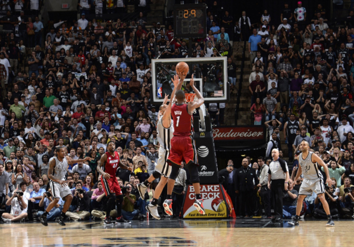 Chris Bosh lifted the Heat -- who were without Dwyane Wade and LeBron James -- past the Spurs on a go-ahead three-pointer with 1.1 seconds remaining. (D. Clarke Evans/NBAE via Getty Images)