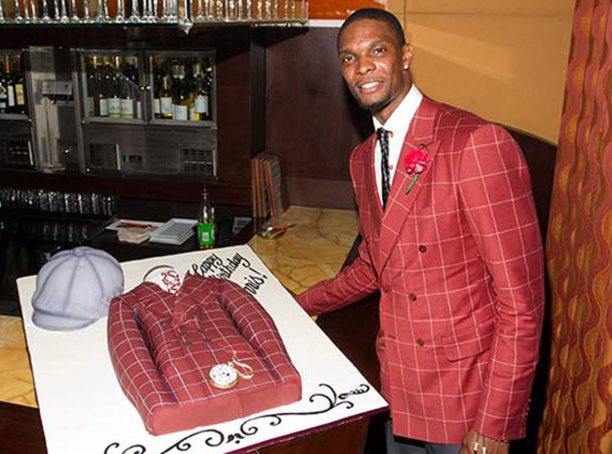 Chris Bosh poses with his birthday cake