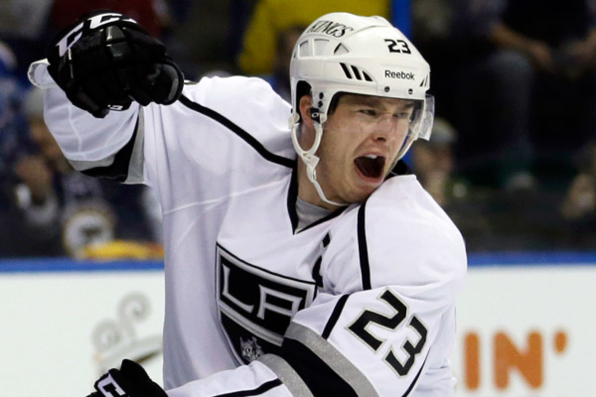 Dustin Brown will earn an average of $5.875 million over the next eight years with the Kings. (AP)