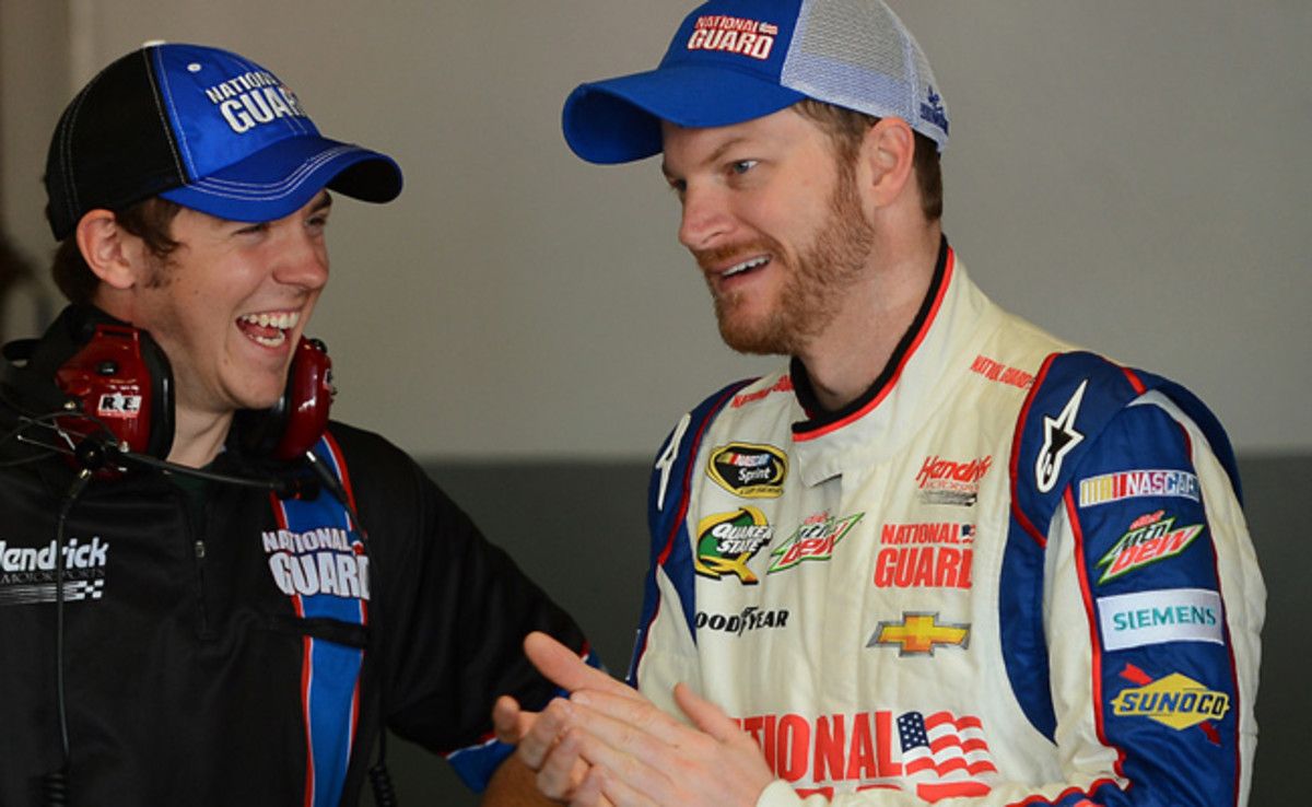 Dale Earnhardt Jr., here talking with a crew member, turned the fast lap by averaging 198.592 mph.