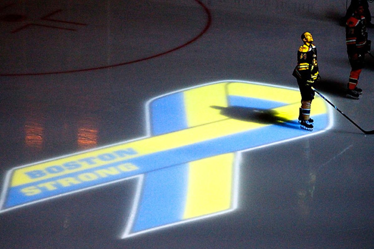 Fans watched a tribute video to their city at Boston's first sporting event since Monday's bombings.