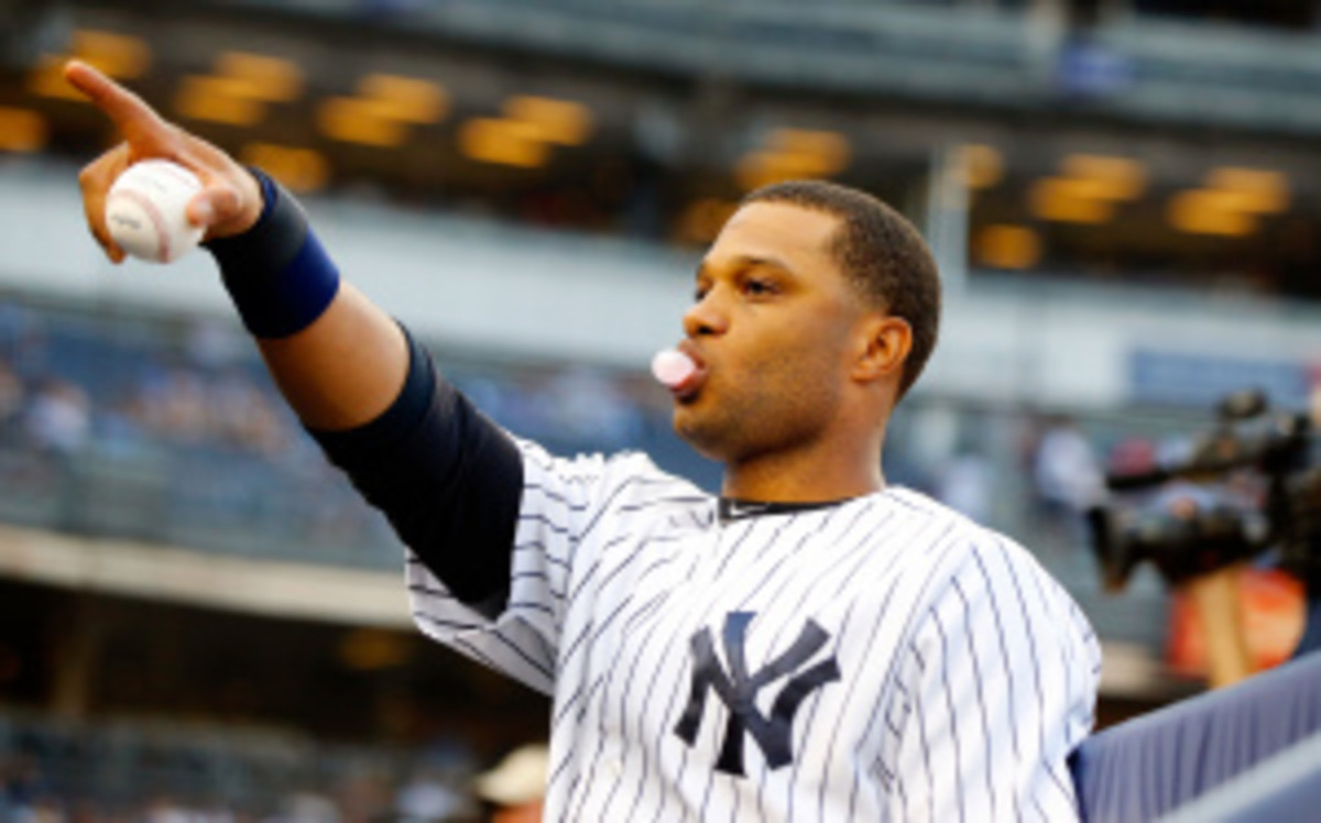 Yankees second baseman Robinson Cano is reportedly seeking a 10-year, $305 million deal this offseason. (Jim McIsaac/Getty Images)