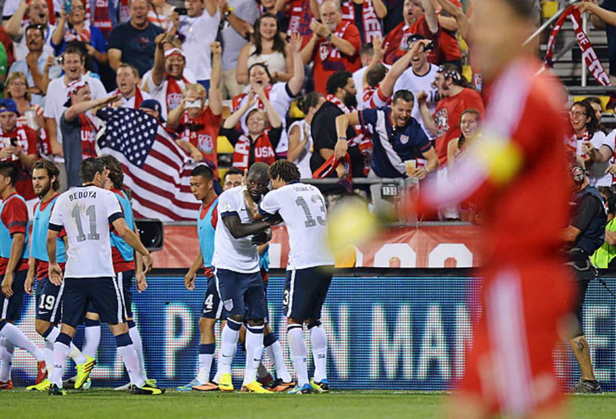 Eddie Johnson scored and the U.S. received raucous support in a 2-0 victory over Mexico in Columbus. 