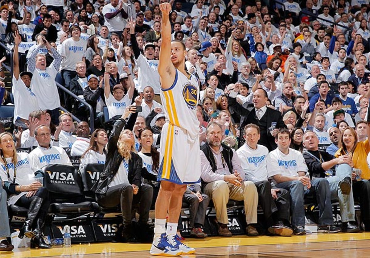 Stephen Curry stares down a three-pointer