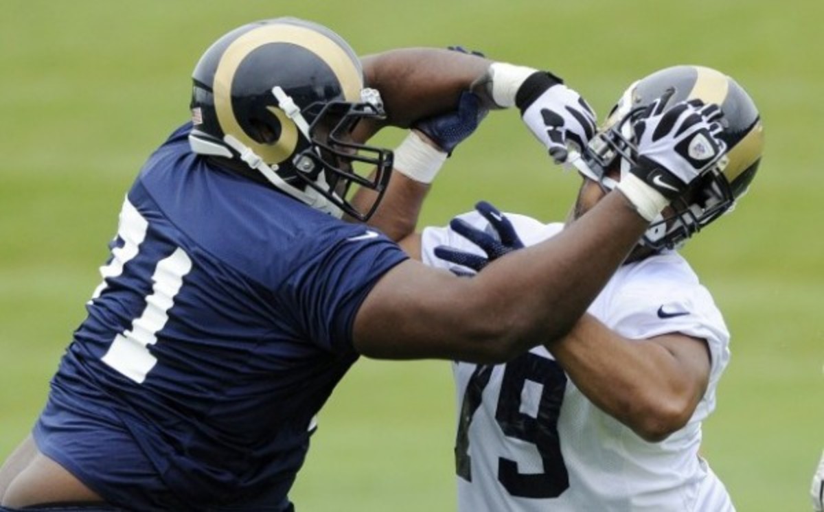 The Rams signed offensive lineman Terrell Brown (left) who tips the scales at 403 pounds. (AP Photo/Bill Boyce)