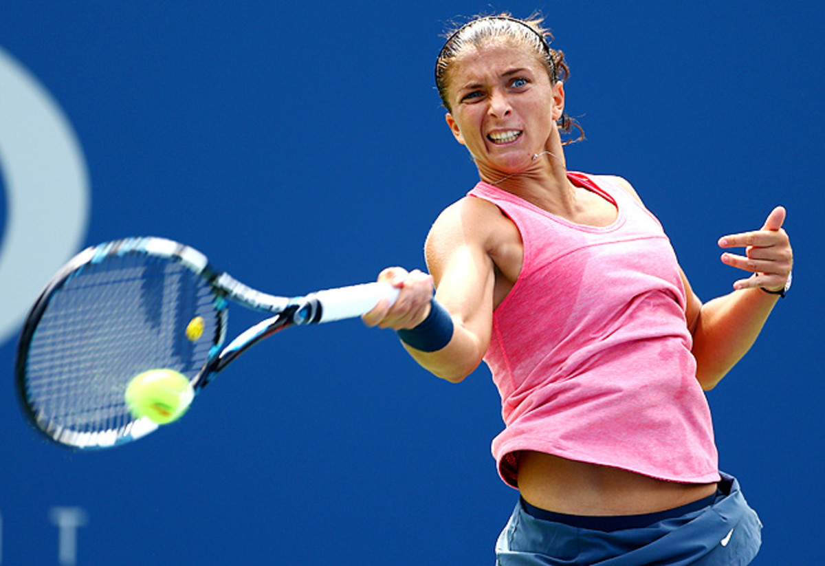 No. 4-seeded Sara Errani was upended by fellow Italian Flavia Pennetta 6-3, 6-1.