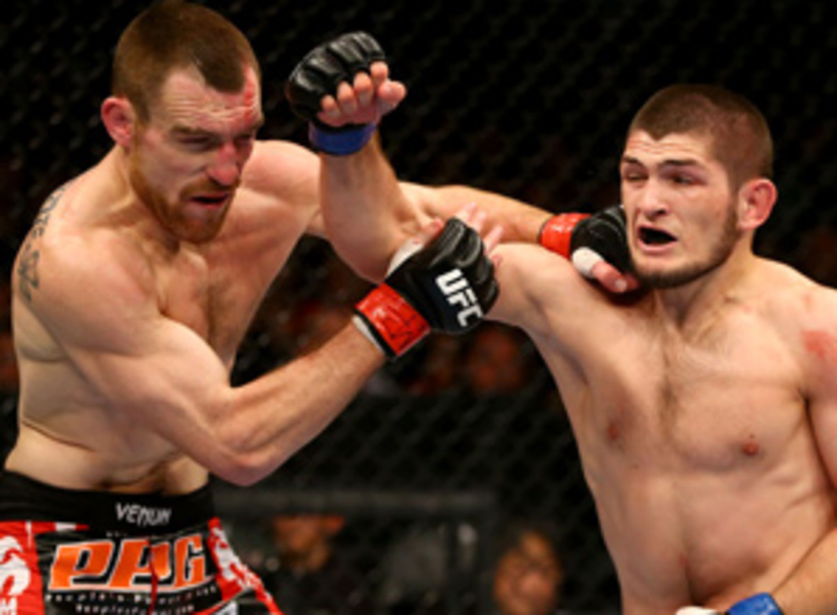 Khabib Nurmagomedov (right) improved his record to 21-0 by beating Pat Healy at UFC 165.