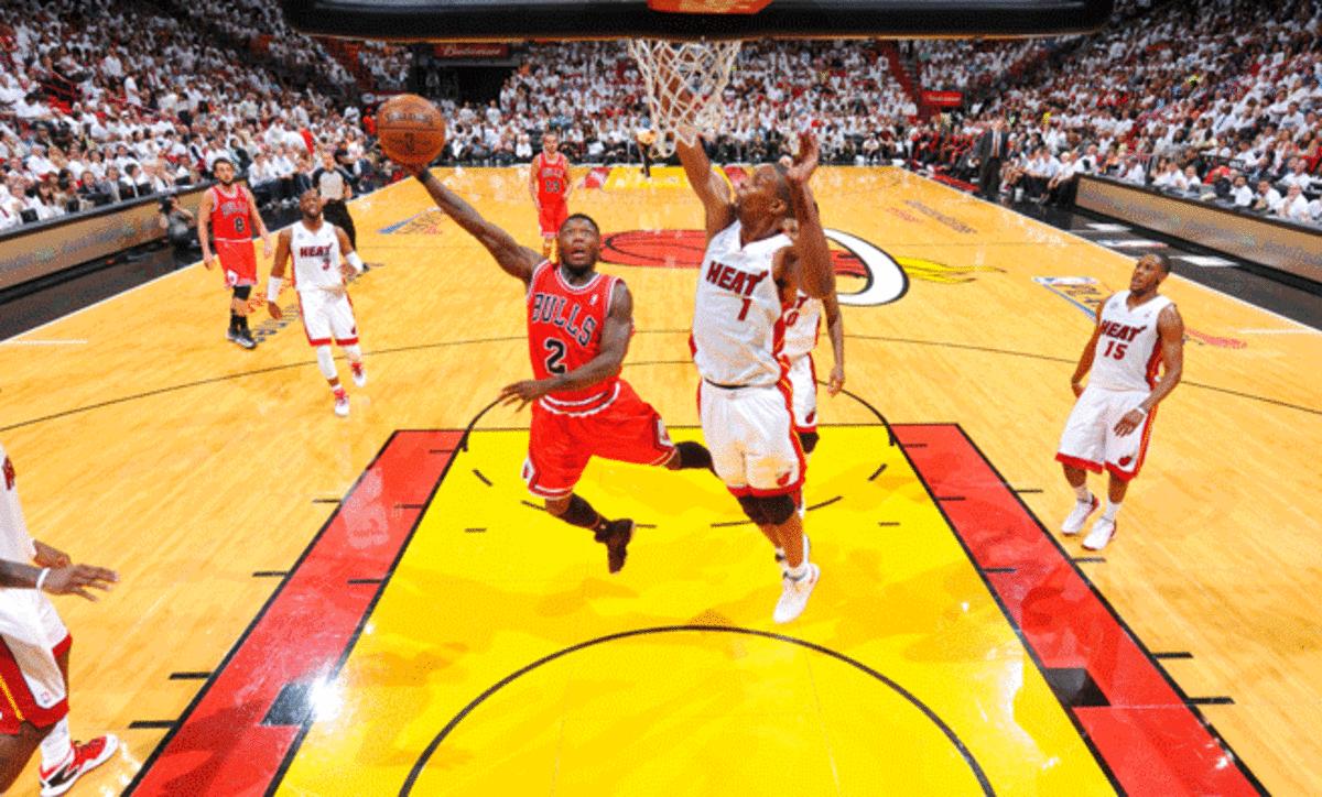 With a spectacular 27-point performance in a playoff win over the defending champion Miami Heat, Chicago's Nate Robinson (left) is quickly moving up the list of all-time Robinsons. 