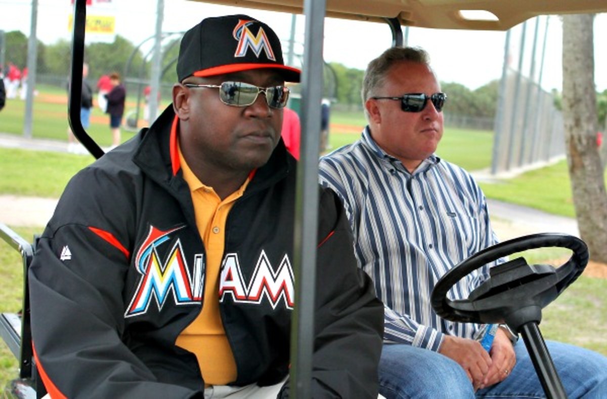 The Marlins relieved President of Baseball Operations Larry Beinfest (right) of his duties. (Getty Images)