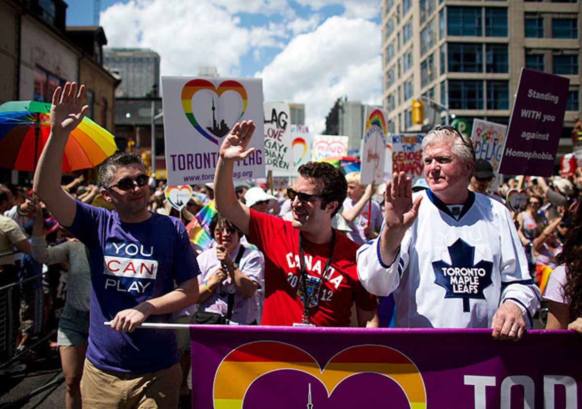 Patrick Burke (left) and his father Brian (right) have spearheaded the NHL's You Can Play campaign.