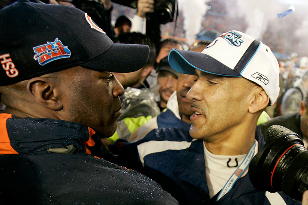 Pupil and mentor: Lovie Smith and Tony Dungy shared a moment after Super Bowl XLI, when they jointly broke the color barrier for head coaches at the Super Bowl. (David Duprey/AP)