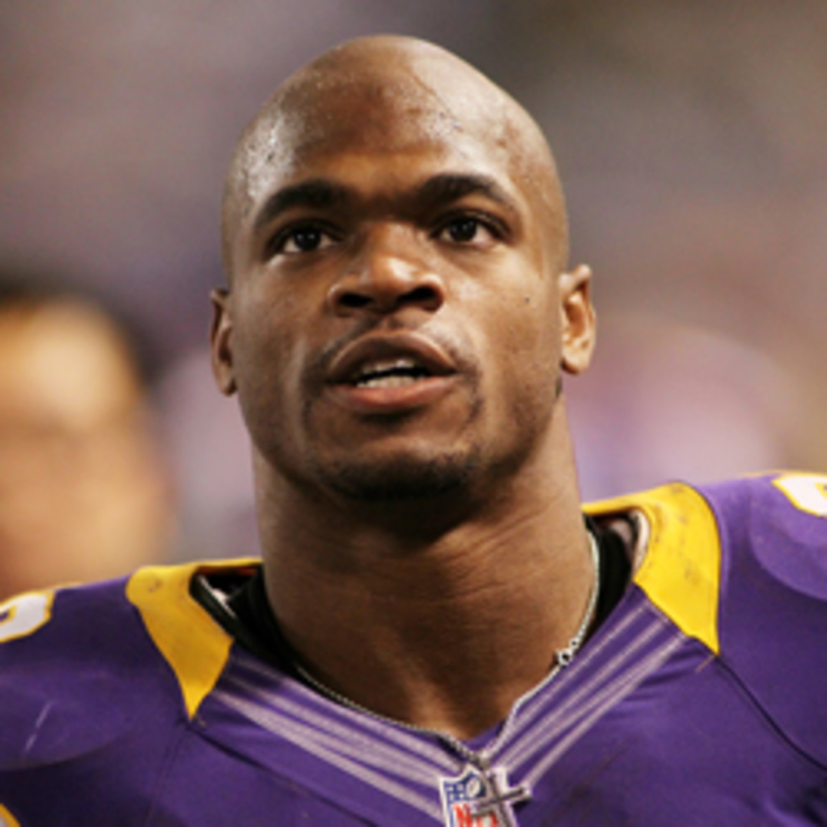 NFL MVP Adrian Peterson wants the Vikings to keep receiver Percy Harvin. (Andy King/Getty Images)