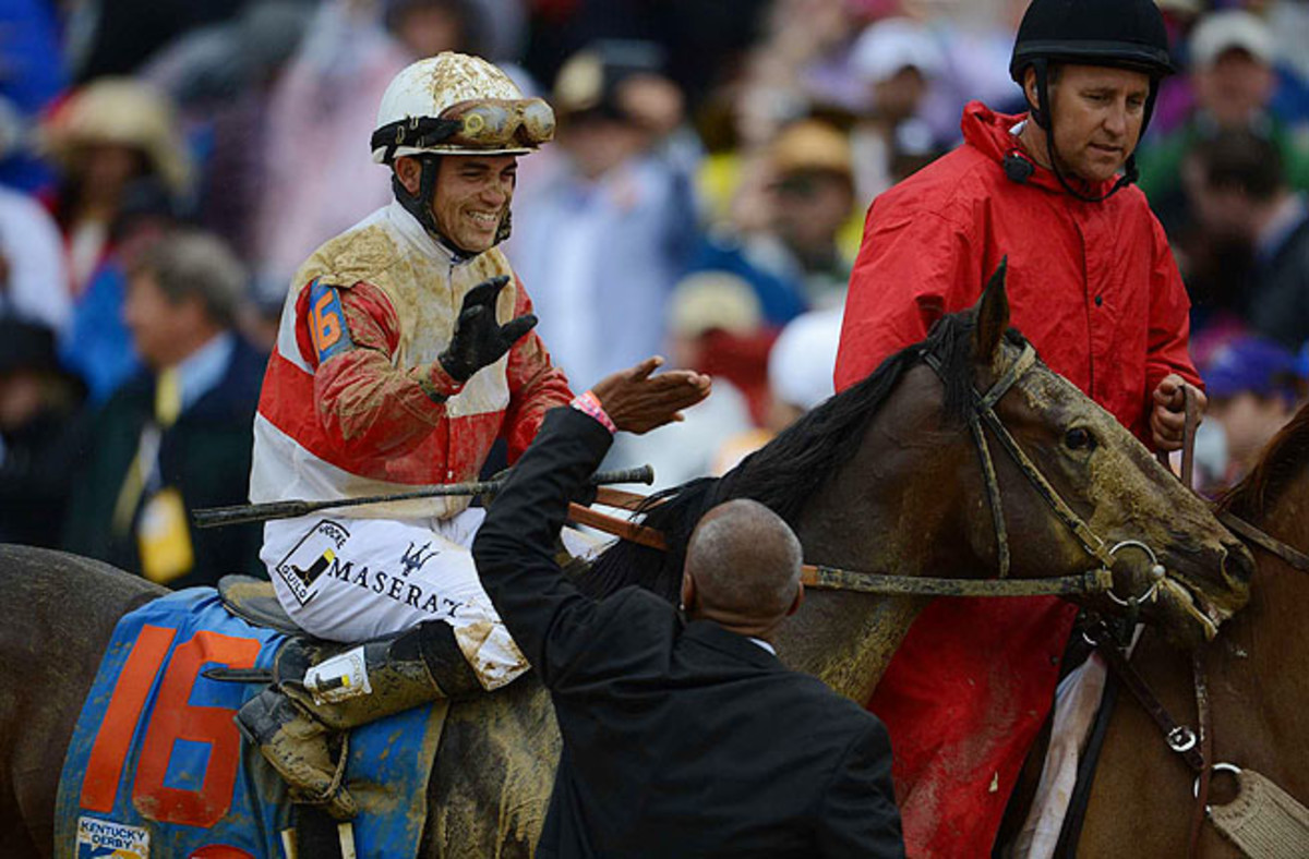 Jockey Joel Rosario atop Orb celebrates after winning the Kentucky Derby on May 4. 