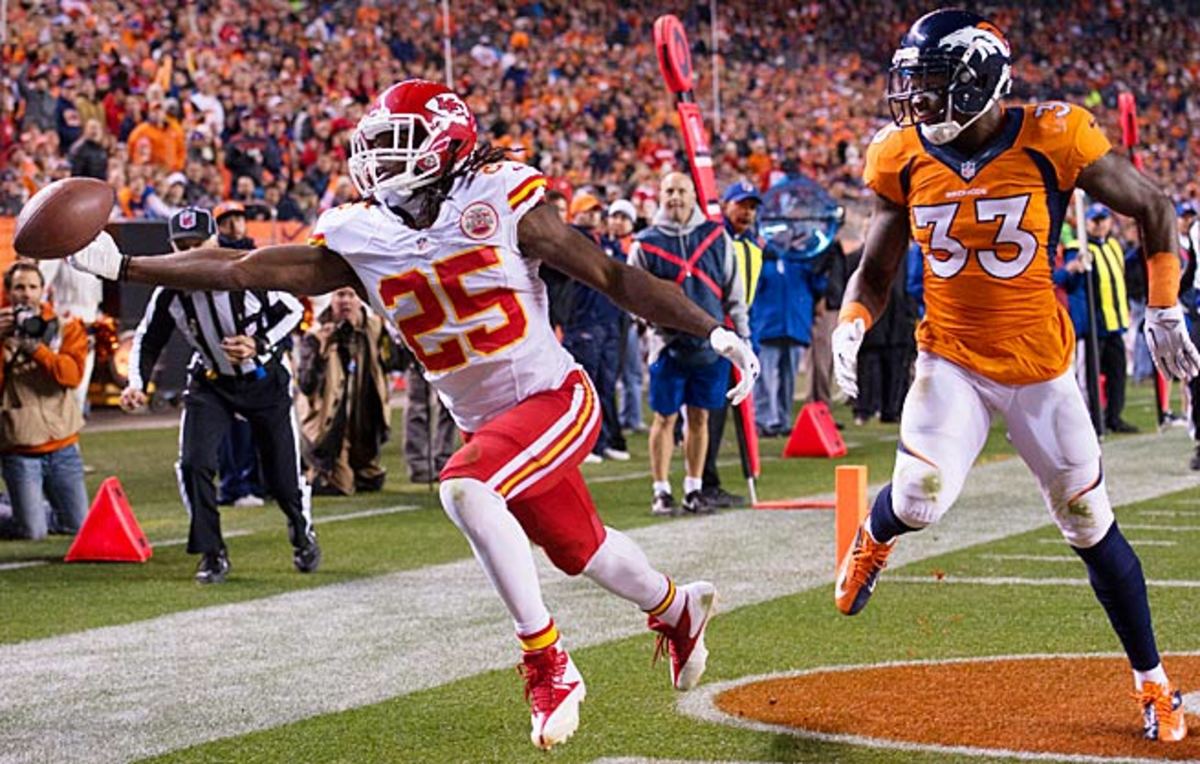 Jamaal Charles couldn't quite haul in this catch on a day when he finished with negative receiving yards.