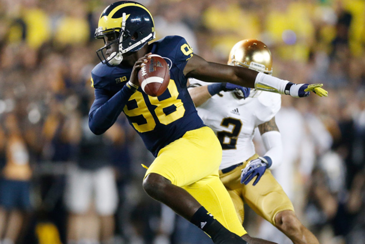 Devin Gardner threw four touchdowns and ran for another in Michigan's 41-30 win Saturday night.