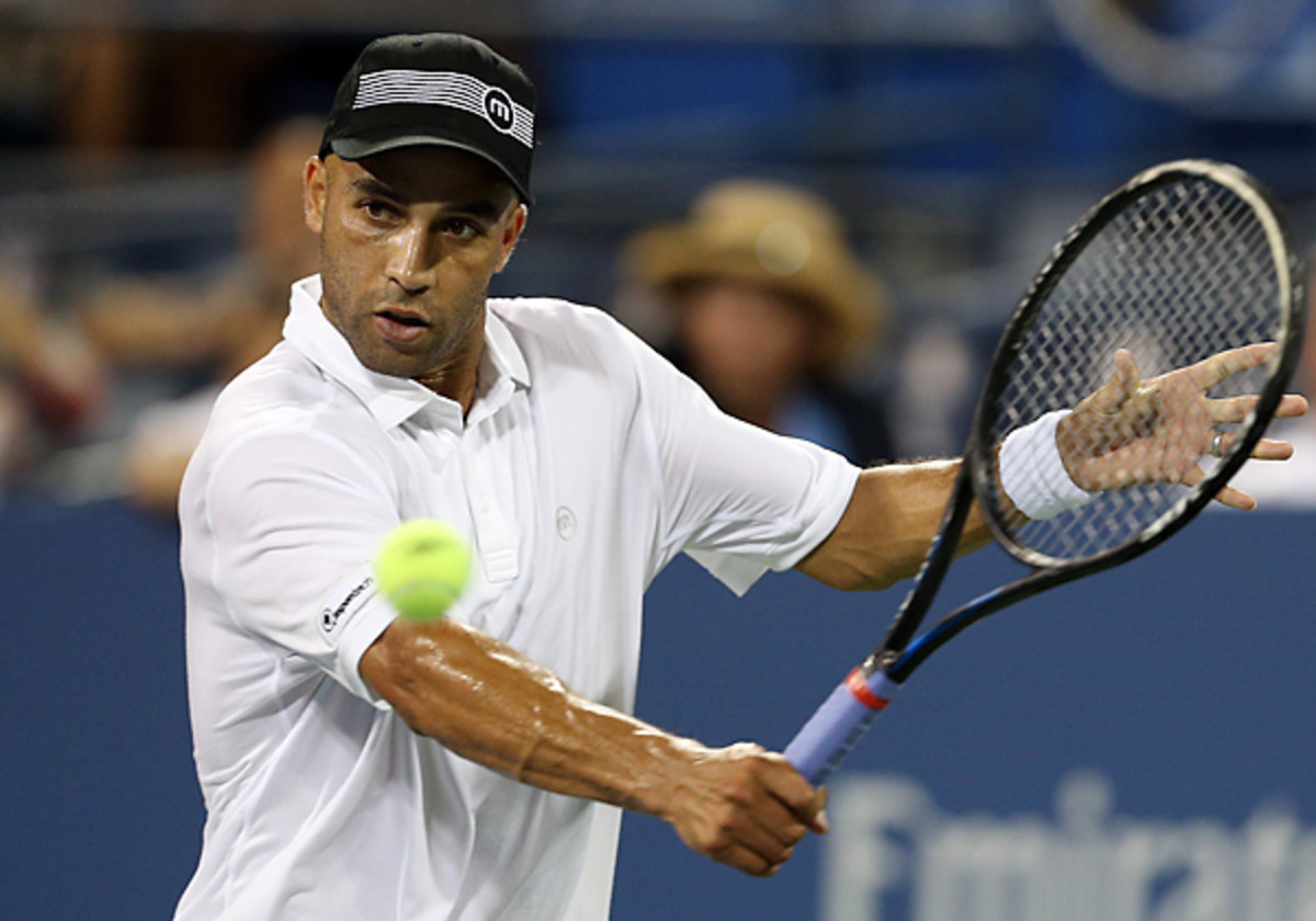 In losing at the U.S. Open, James Blake ended his singles career at the tournament he used to sneak into as a kid. (Clive Brunskill/AP)