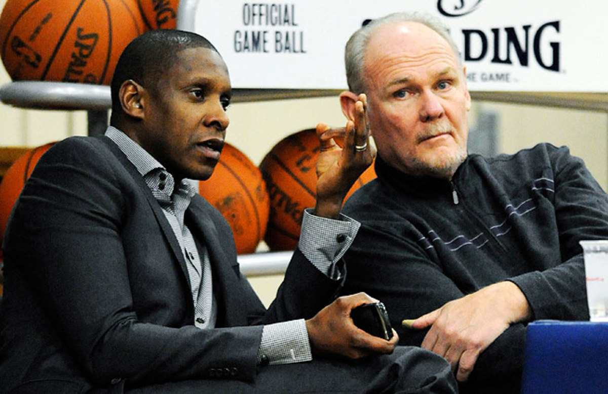 George Karl (right) and Masai Ujiri both earned accolades after the best season in Nuggets history.