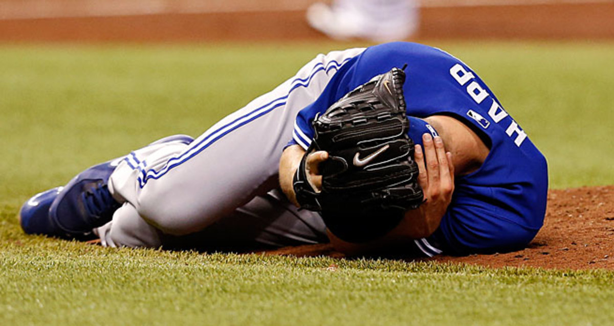 J.A. Happ was struck by a line drive from the Rays' Desmond Jennings and left the field on a stretcher.