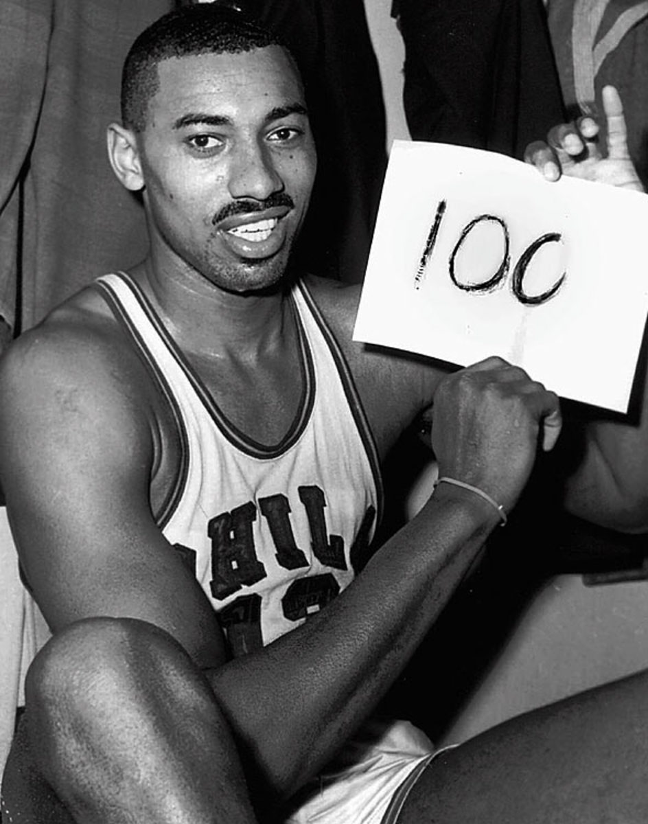 Wilt Chamberlain scores 100 points