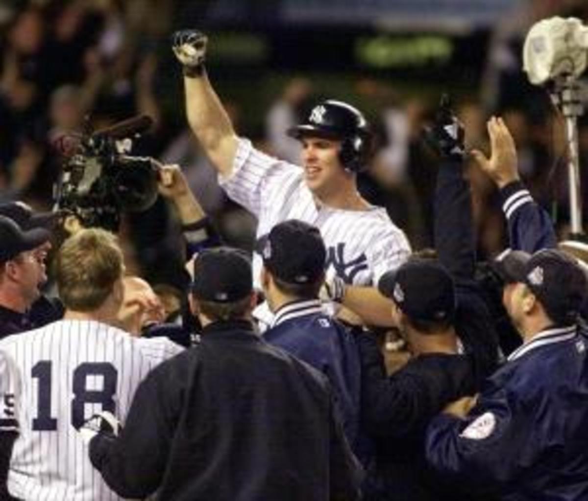 Chad Curtis of the New York Yankees is carried off