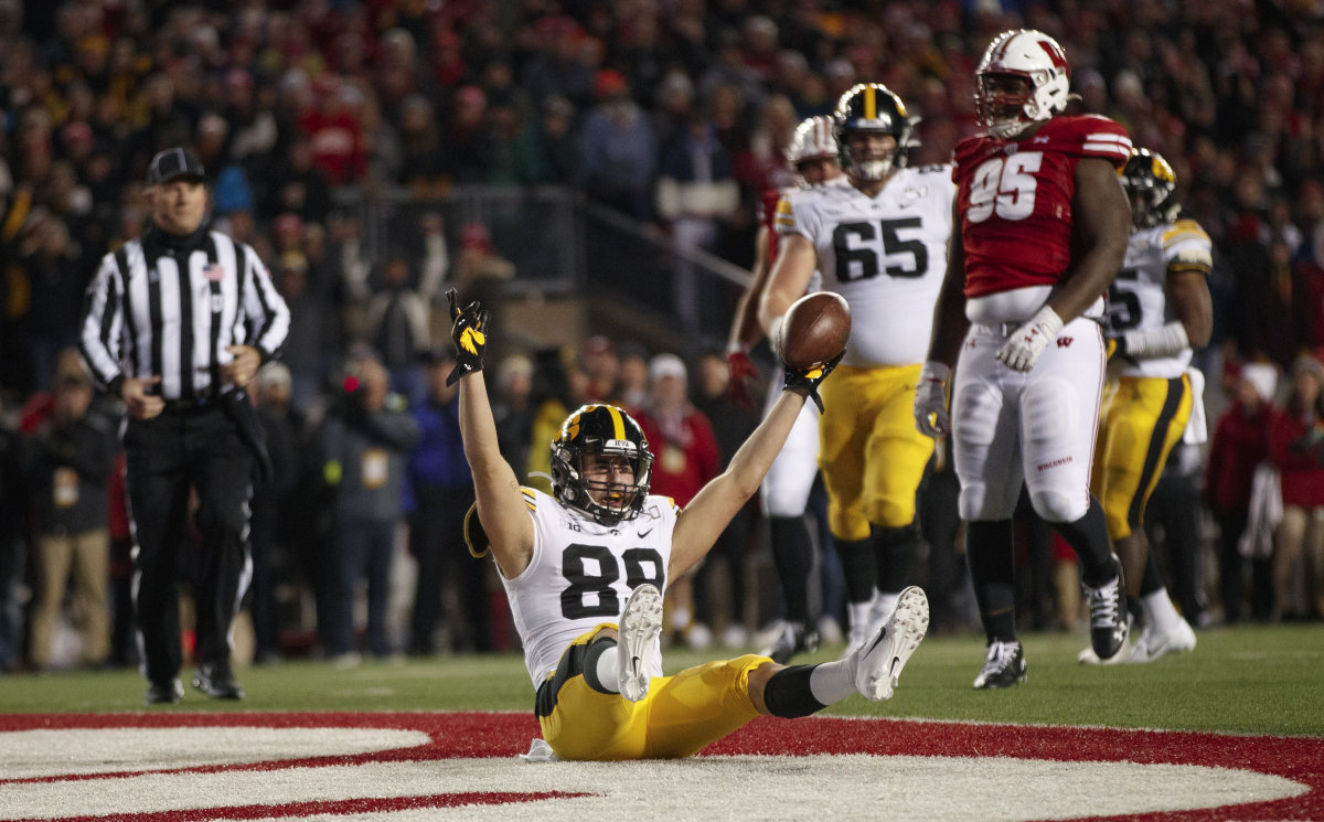 Iowa's Nico Ragaini celebrates his touchdown catch in the fourth quarter of Saturday's 24-22 loss at Wisconsin.