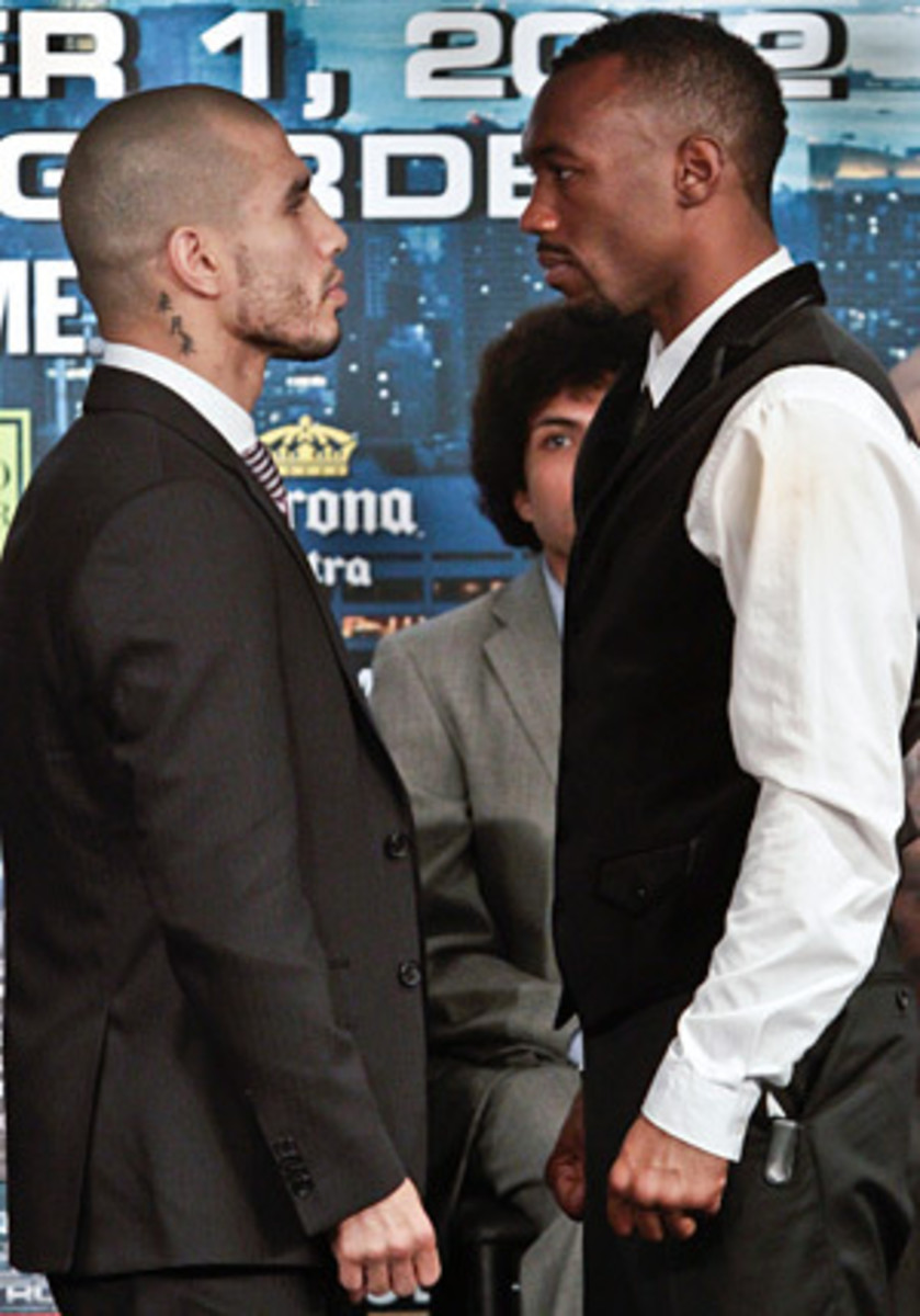 Austin Trout (right) defends his super welterweight title belt Saturday against the favored Miguel Cotto at Madison Square Garden. (AP)