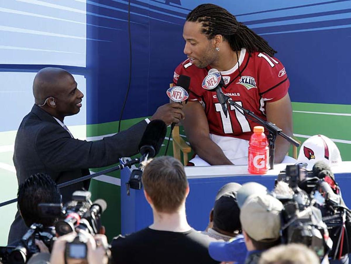 Deion Sanders and wide receiver Larry Fitzgerald