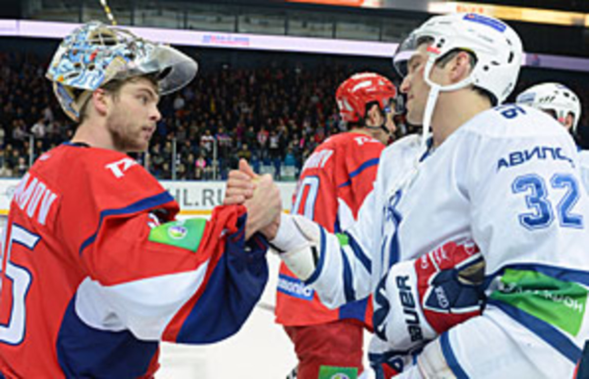 Semyon Varlamov (left) of the Avalanche is tending goal for the KHL's reborn Lokomotiv Yaroslavl a year after its tragic plane crash.