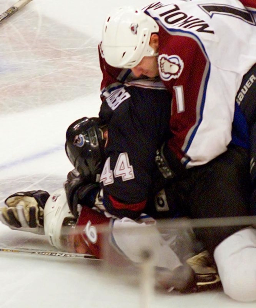 Todd Bertuzzi sucker-punches Steve Moore