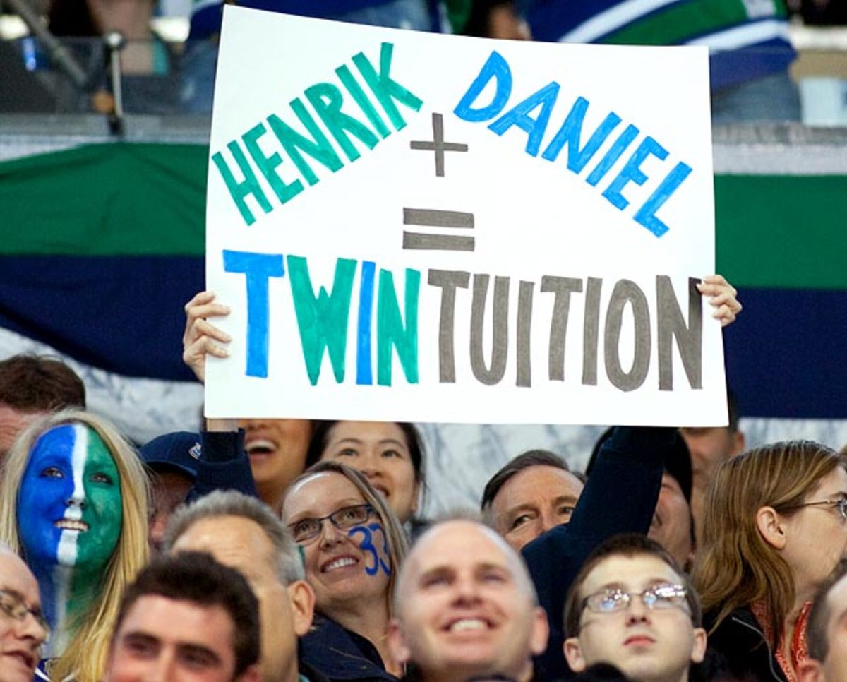 canucks-fan-sedin-twins-sign.jpg