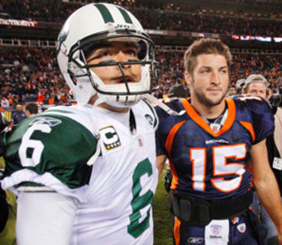 tim-tebow.mark.sanchez.jpg
