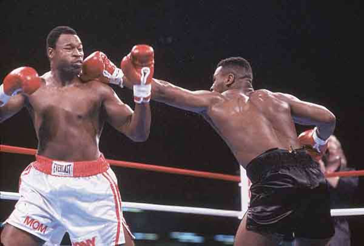 Mike Tyson and Larry Holmes