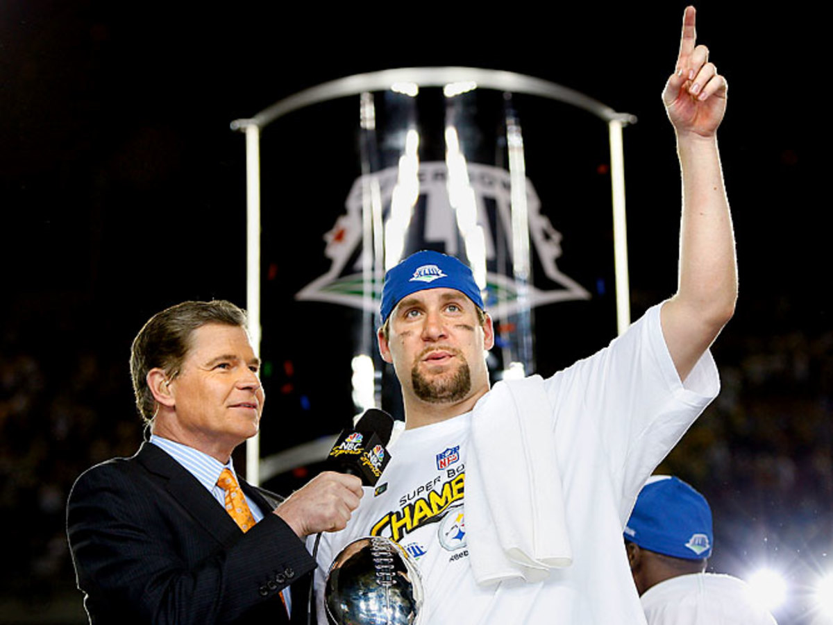 Dan hands out the Super Bowl Trophy