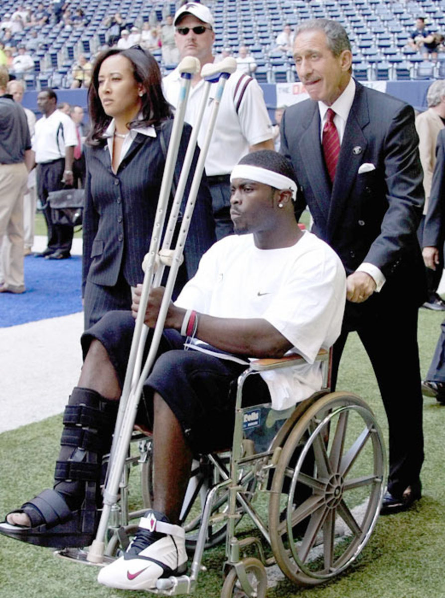 Michael Vick and Arthur Blank