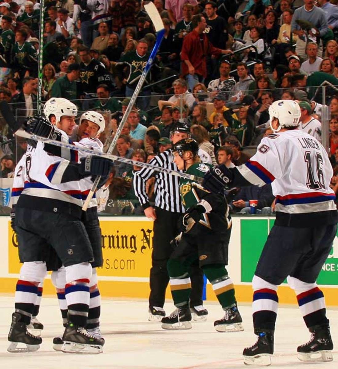 Canucks 2, Stars 1, OT