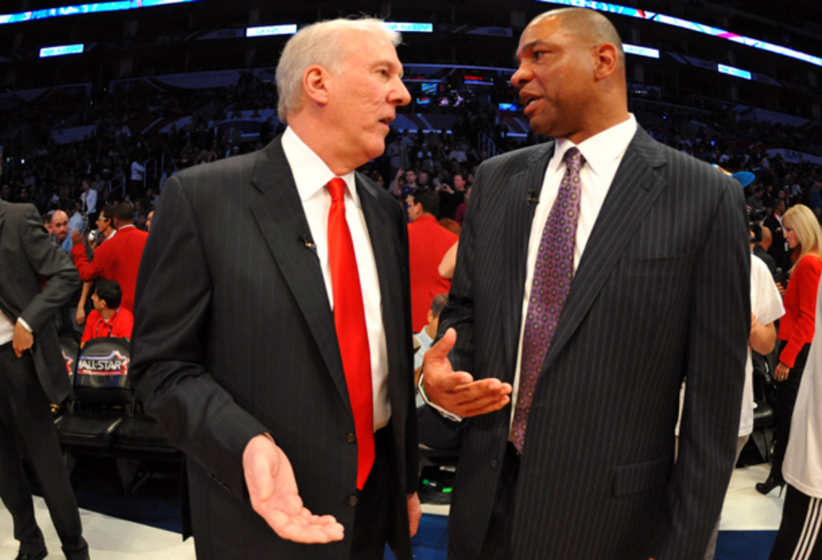 Doc Rivers, right, stood up for Gregg Popovich, left, on Friday. (Jesse D. Garrabrant/Getty Images)