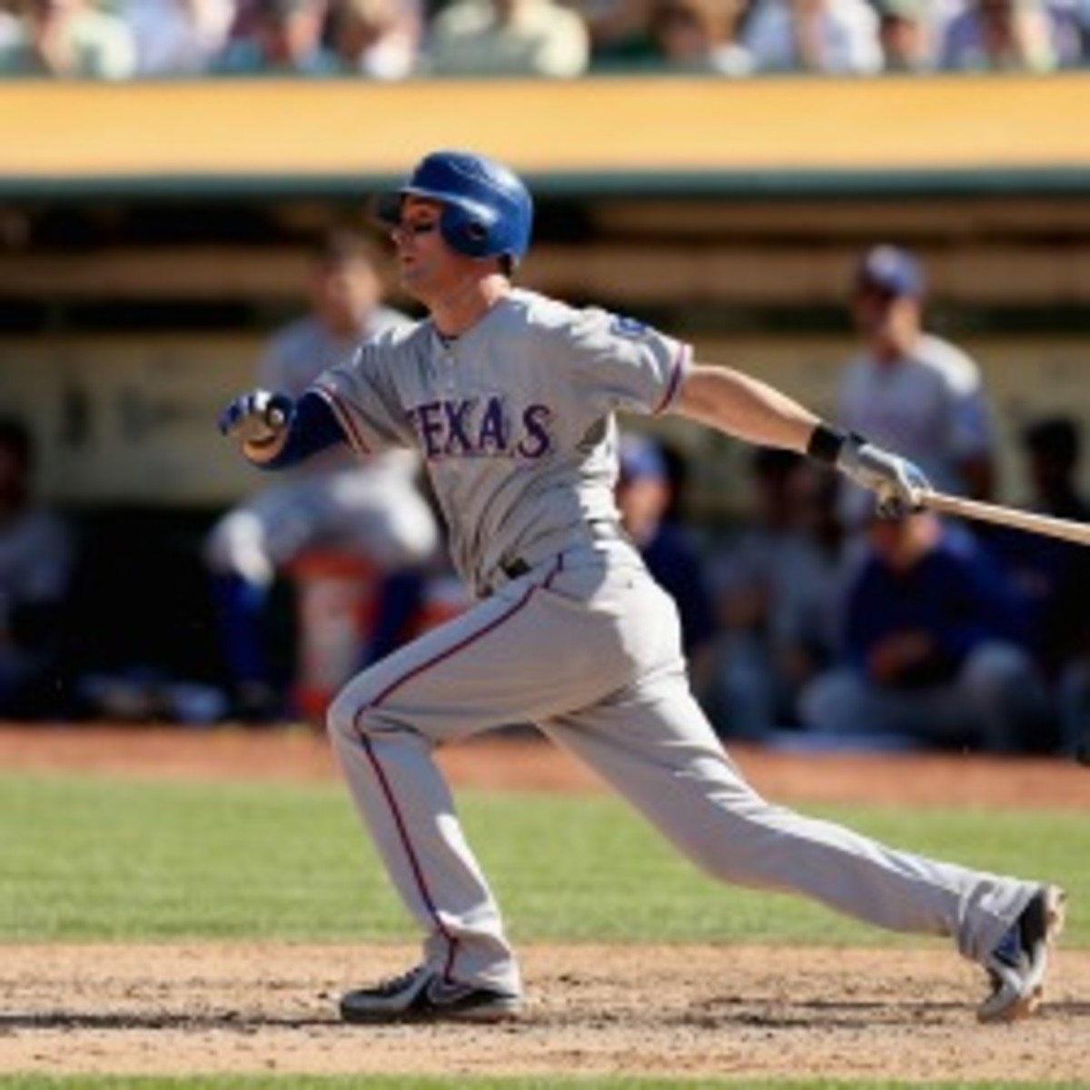 The Texas Rangers traded third baseman Michael Young for prospects on Saturday. (Ezra Shaw/Getty Images)