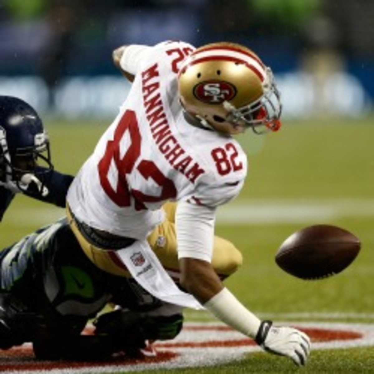 49ers wideout Mario Manningham will miss the remainder of the season with a knee injury. (Otto Grutele/Getty Images)