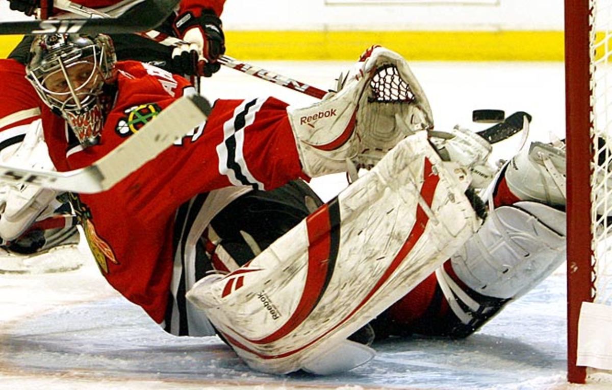 Nikolai Khabibulin makes the save