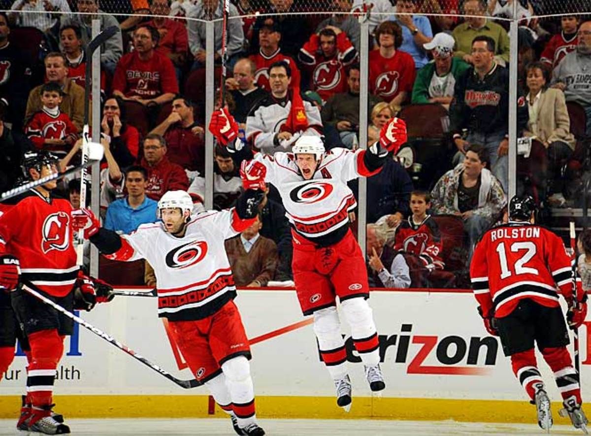 Erik Cole and Eric Staal celebrate in OT