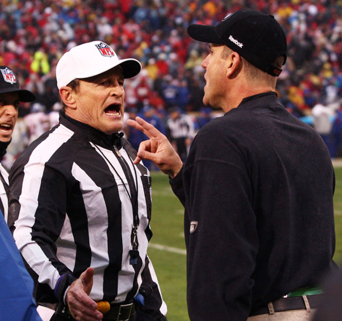 Ed Hochuli and Jim Harbaugh 