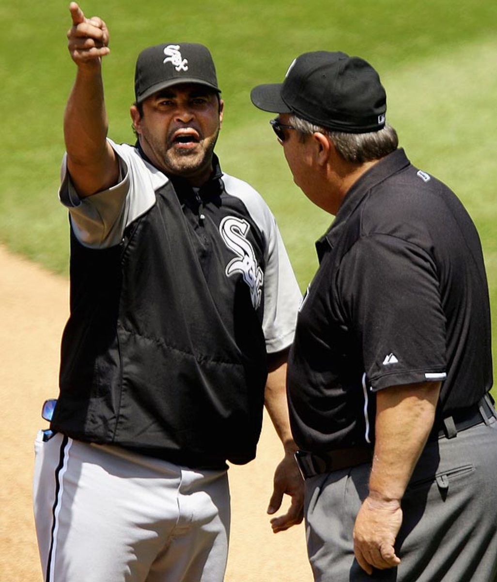 ozzie-guillen-joe-west.jpg
