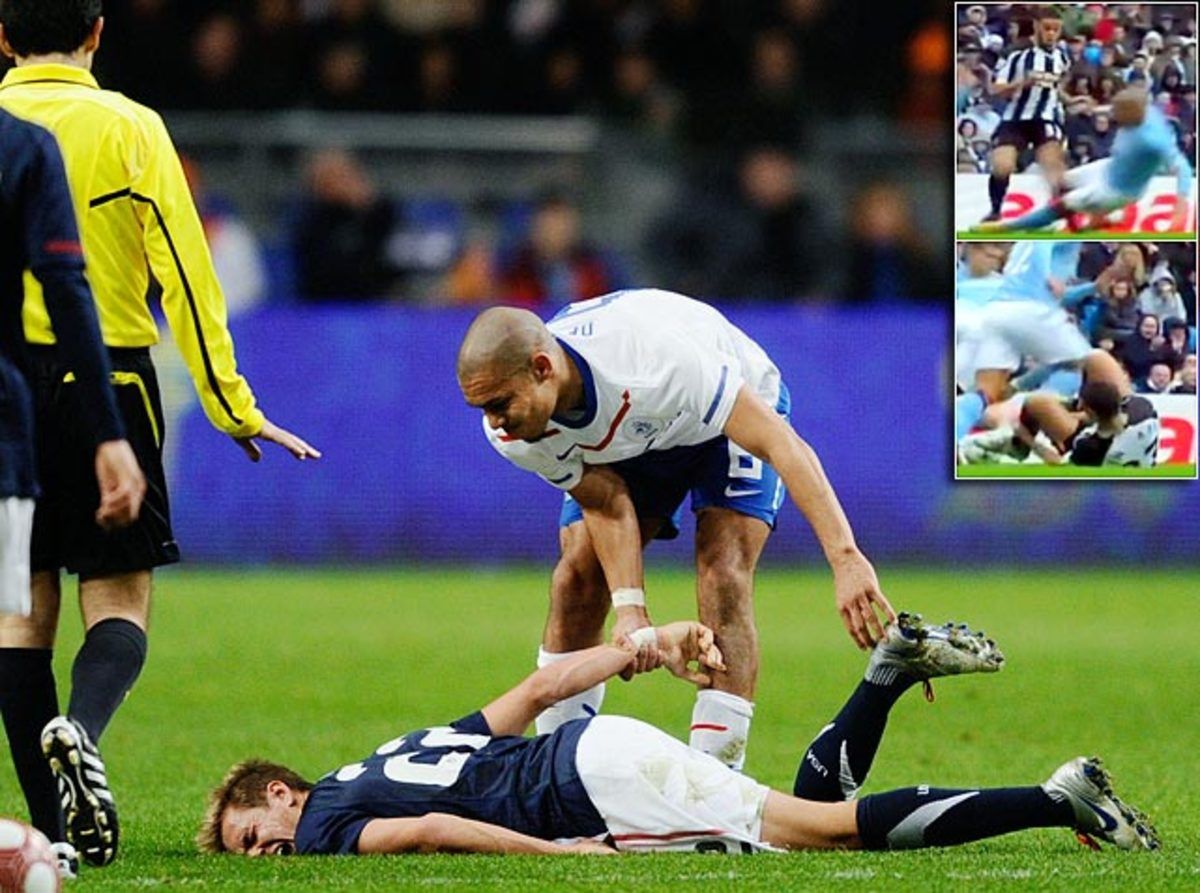 nigel-de-jong-stuart-holden.jpg