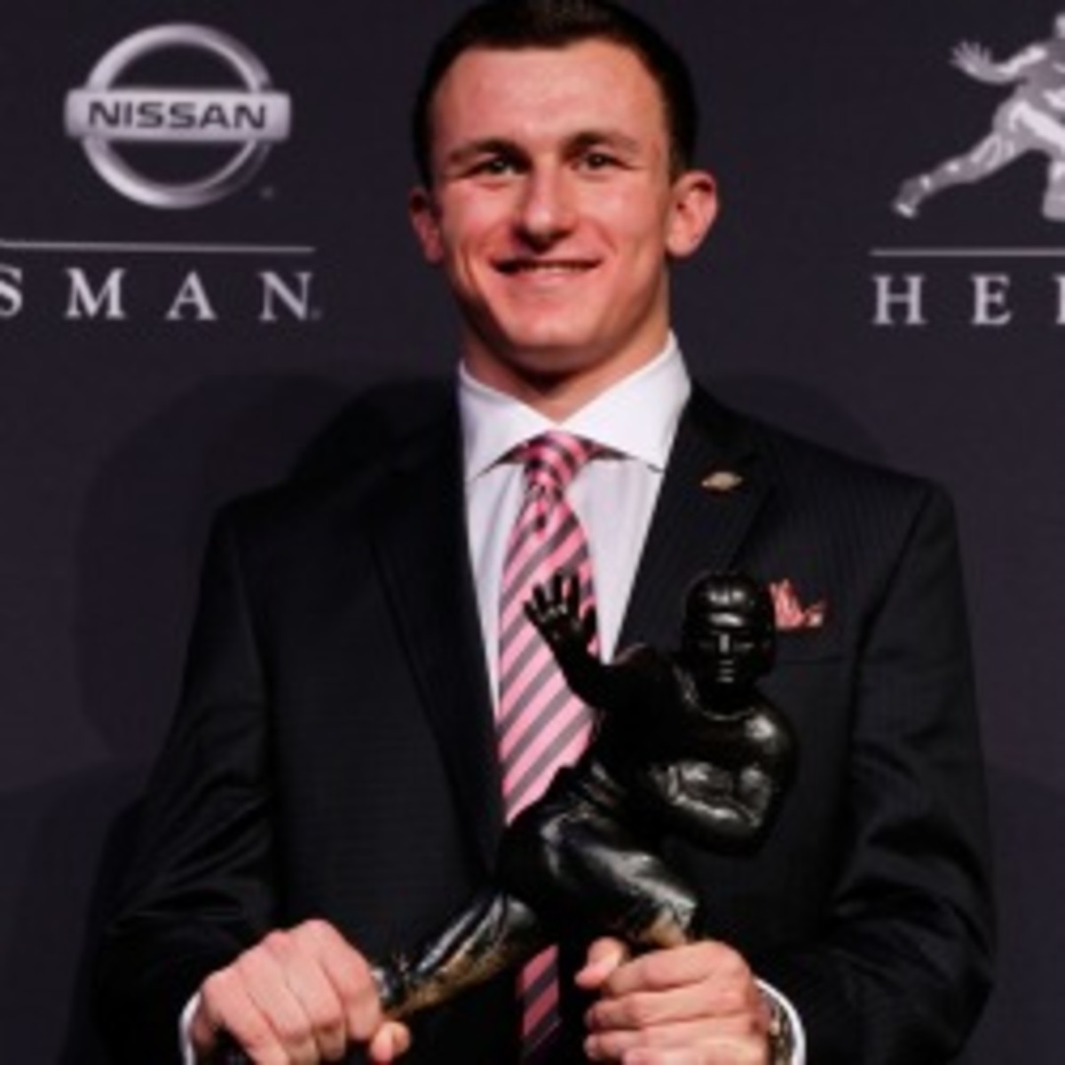 Texas A&M quarterback Johnny Manziel won the 78th Heisman Trophy on Saturday. (Mike Stobe/Getty Images)