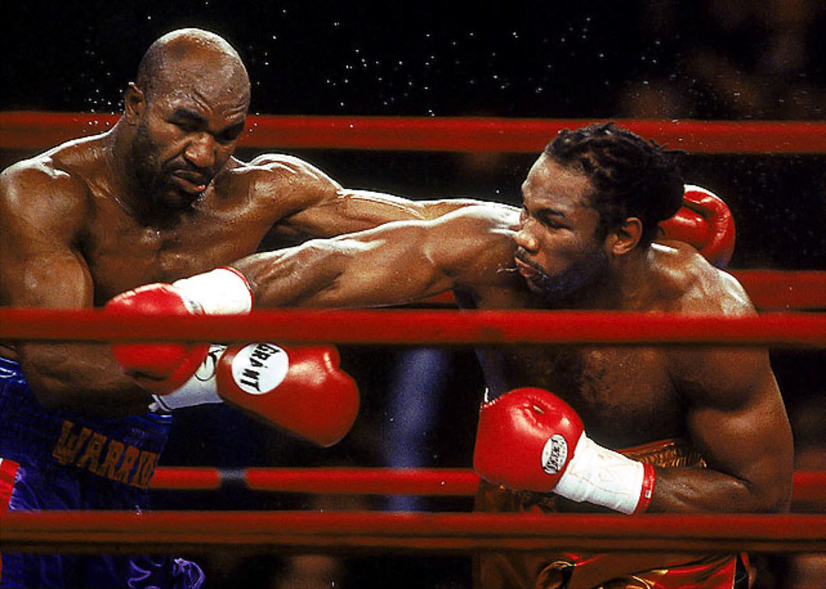 Evander Holyfield draw with Lennox Lewis