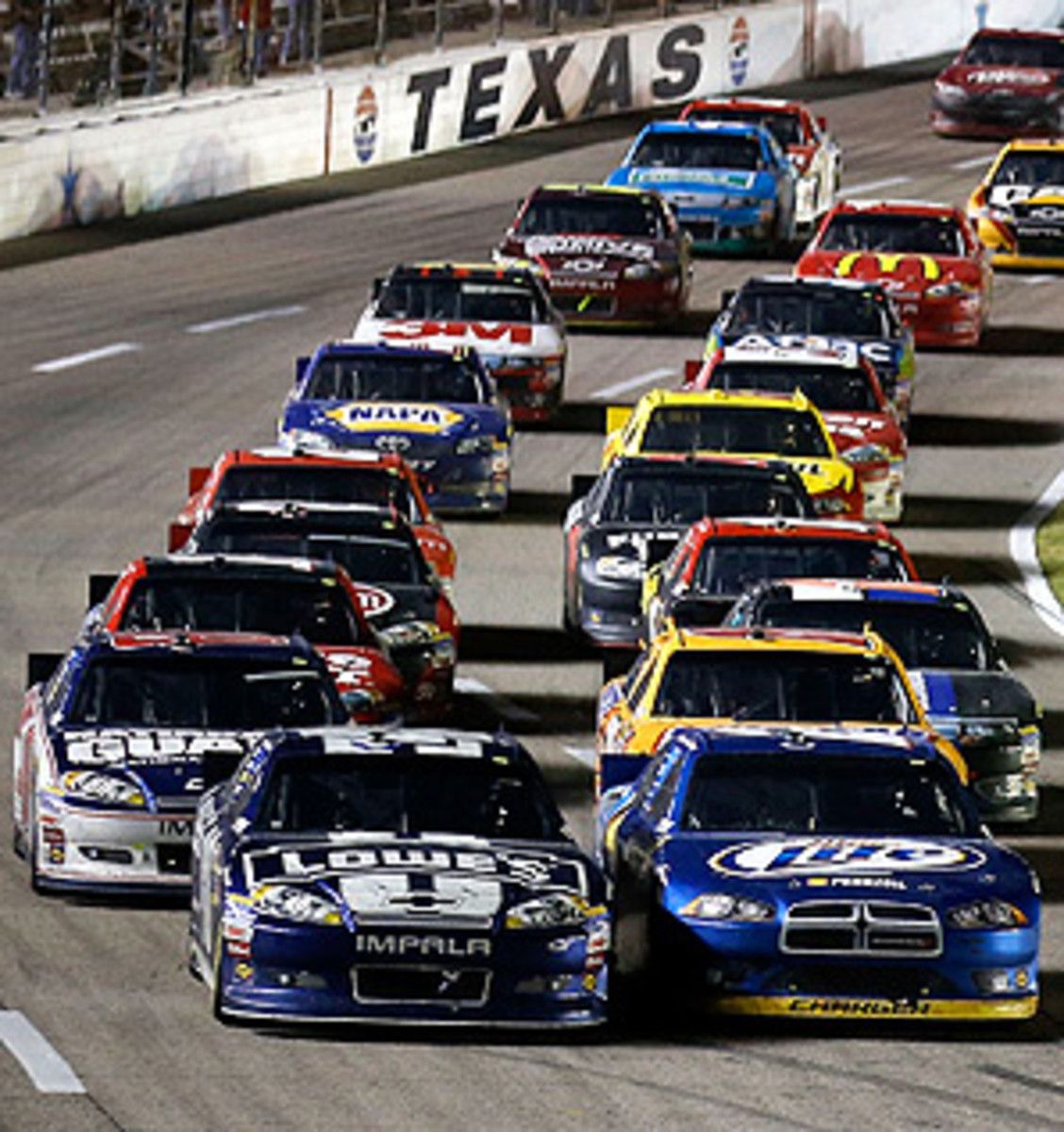 Jimmie Johnson and Brad Keselowski led the field at the final restart in Texas, and battled until the finish.