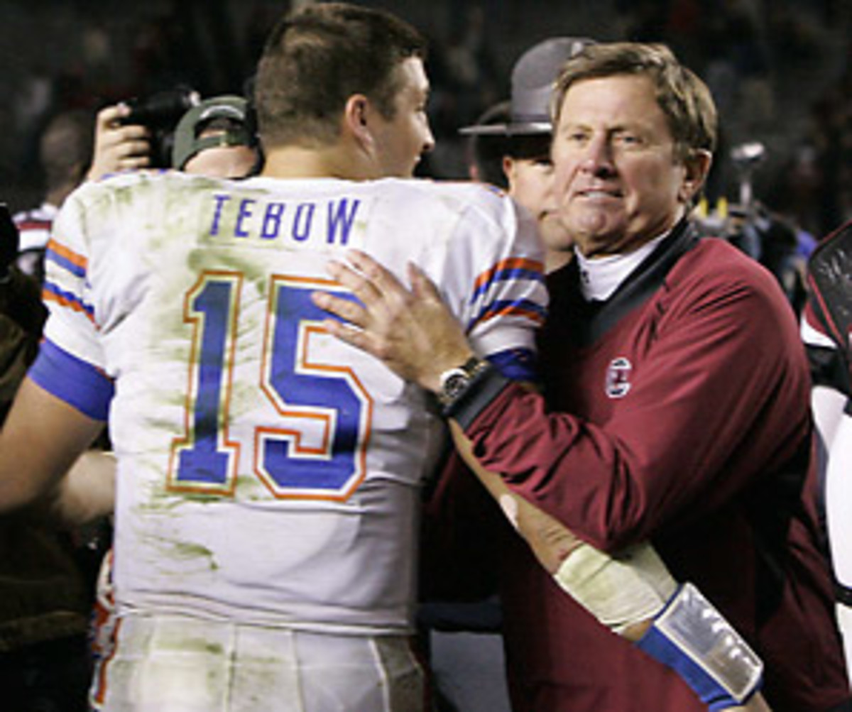 tebow-spurrier-p1.jpg