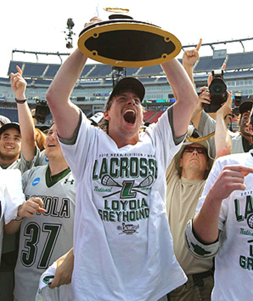 The Loyola (Md.) Greyhounds celebrate their first NCAA lacrosse championship. The team beat Maryland 9-3 in the finals.